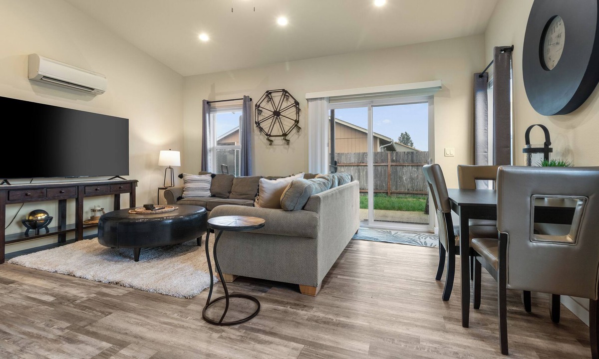 Grand Mound House | Centralia home minutes to NW Sports Hub. Modern two bedroom - primary ensuite. Main level bedroom with full bathroom adjacent. Full kitchen. Fully fenced backyard with covered patio. In home laundry - full size washer/dryer. Parking - 4 cars