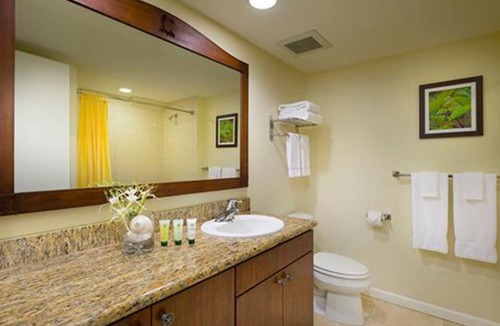 Wailua Resort | Beachfront is set amid palm trees on 6 acres of beautifully landscaped gardens!
