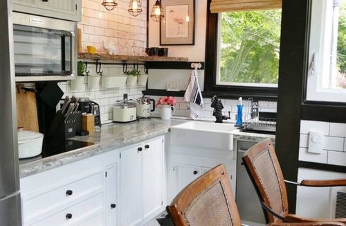 West Woodland Cottage | Cozy Banana Cabana w/soaking tub heated floors in secluded garden