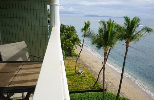 Historic Lahaina Front Street Apartment | Incredible ocean view above the palms! Lahaina Shores 603 is waiting for you.
