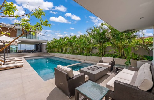 Kalama Tract House | Kailua Beach Escape by Gather: Luxury Beachfront Estate w/Pool, Hot Tub & Views