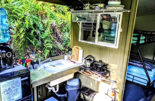 Pepeekeo Cabin | Rustic Vacation Rental Surrounded by Rainforest close to Volcanoes National Park, Hawaii