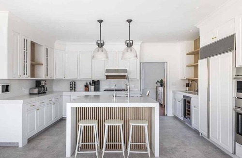 Sagaponack House | Timeless Hamptons retreat featuring a saltwater pool, tennis court, and.