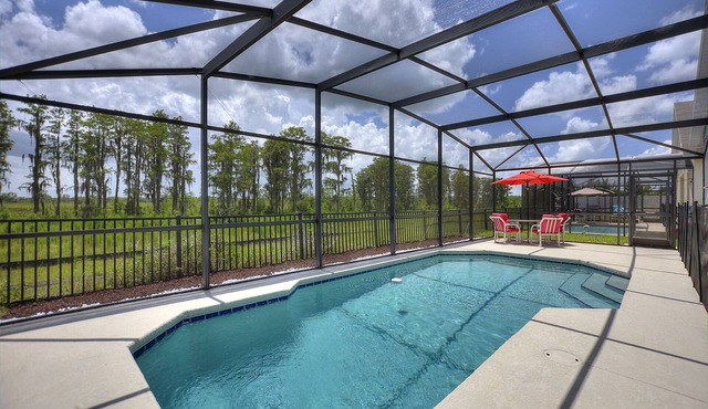 Pet friendly Pool Home with King suite 10 minutes to Disney World in Davenport