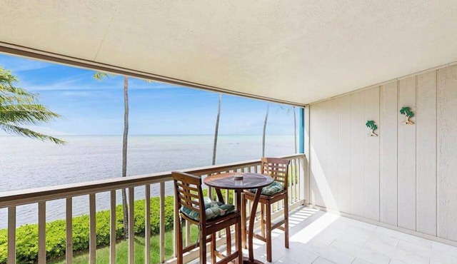 Take In Water Views from a Third-Floor Oceanfront Condo with Pool
