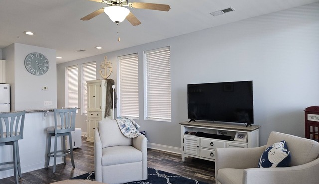 Water view condo overlooking Marina, with private deck in Southport