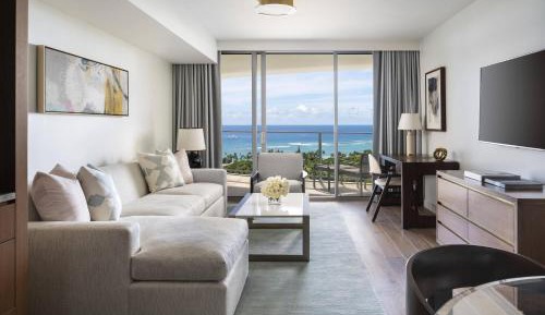 Deluxe One-Bedroom Suite with Two Double Beds and Ocean View