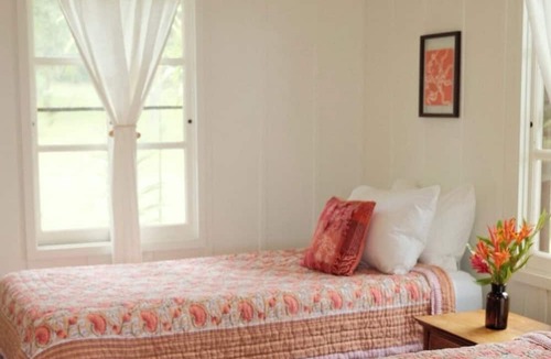 Kaunakakai Cottage | Rustic retreat with panoramic views, tropical gardens, & biodynamic produce!