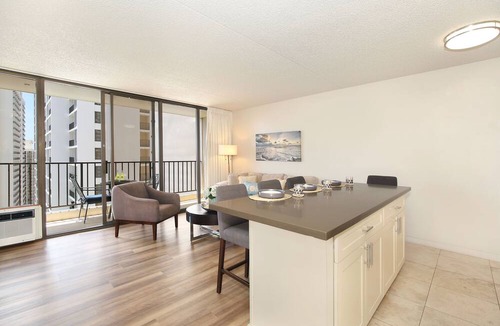 Waikiki Condo | Partial Ocean View, one-bedroom with AC, Wi-Fi, parking, short walk to beach!