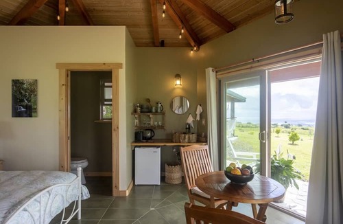 Hilo House | Recharge in a Self-Sufficient Ocean View Eco Village