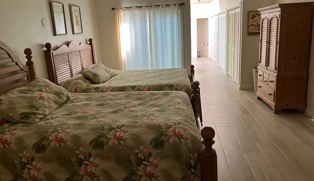 Refreshed & spacious 5 br. Home designed for large groups is only steps to sand in Anahola