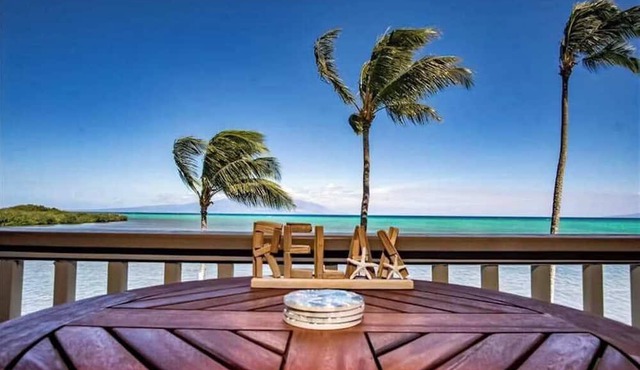 Take In Water Views from a Third-Floor Oceanfront Condo with Pool